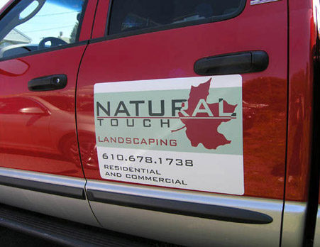 Magnetic sign for landscaping company